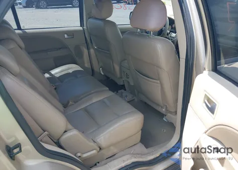 2006 Ford Freestyle Limited from USA, damaged, VIN 1FMDK06156GA09879